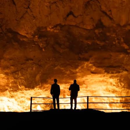 Darvaza gas crater burning at night in the Karakum desert